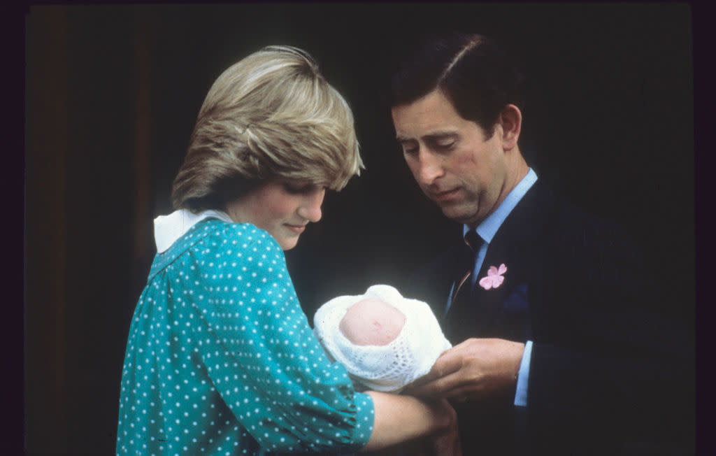 Prince Charles and Princess Diana were one of the first royals to pose on the steps of the Lindo wing with a newborn Prince William. (Photo by Anwar Hussein/Getty Images)