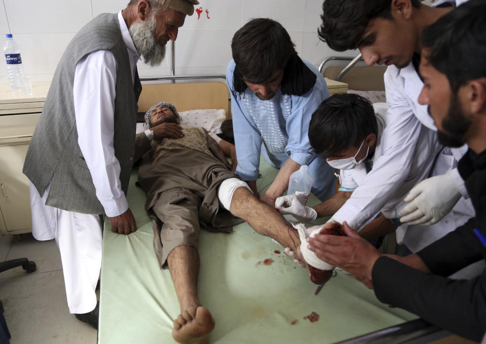 A wounded man receives treatment at a hospital after a suicide attack in northern Parwan province, Afghanistan, Tuesday, Sept. 17, 2019. The Taliban suicide bomber on a motorcycle targeted presidential guards who were protecting President Ashraf Ghani at a campaign rally in northern Afghanistan on Tuesday, killing over 20 people and wounding over 30. Ghani was present at the venue but was unharmed, according to his campaign chief. (AP Photo/Rahmat Gul)