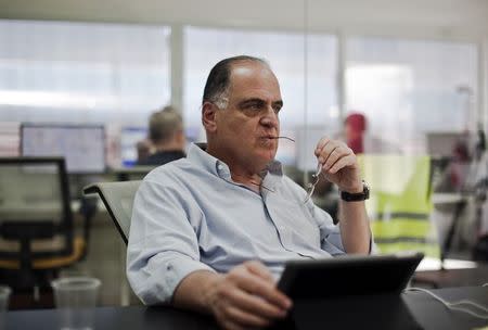 Israeli entrepreneur Avi Brenmiller sits at the control center of his new solar power company Brenmiller Energy near the southern town of Dimona in this September 9, 2014 file photo. REUTERS/Nir Elias/Files