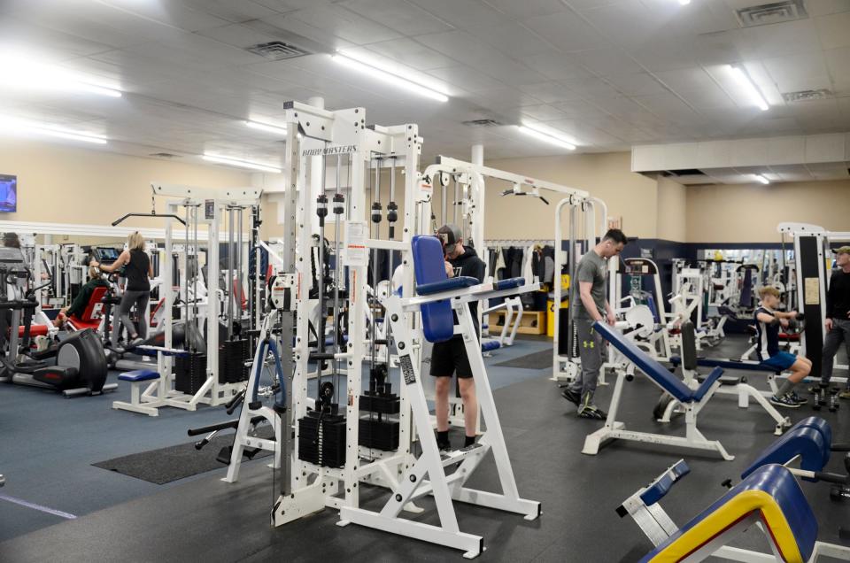 People work out at Center City Gym in Petoskey.