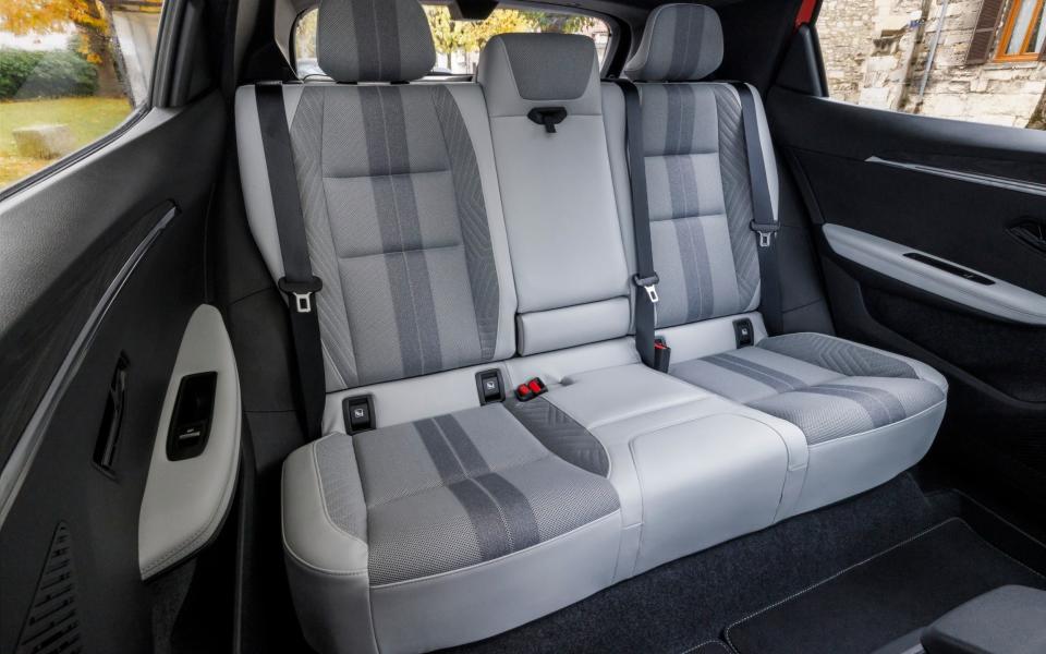 Although the rear seats are roomy, there’s no space to push your feet under the front seats