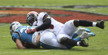 Tampa Bay Buccaneers linebacker Devin White (45) takes down Carolina Panthers running back Christian McCaffrey (22) during the second half of an NFL football game Sunday, Sept. 20, 2020, in Tampa, Fla. (AP Photo/Jason Behnken)