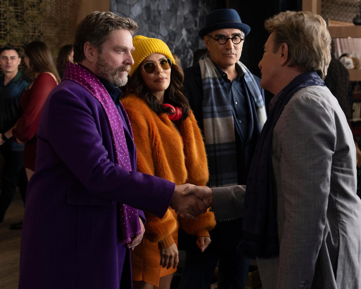 Zach Galifianakis, Eva Longoria and Eugene Levy play themselves playing Oliver, Mabel and Charles in a movie in "Only Murders in the Building" Season 4.