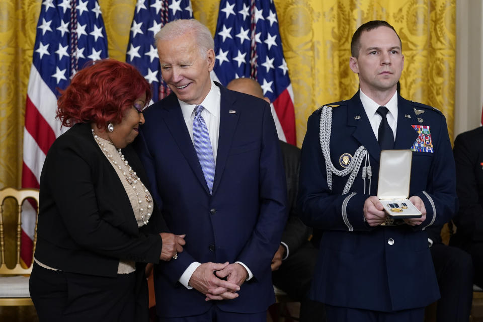 President Joe Biden speaks with Ruby Freeman before awarding her the Presidential Citizens Medal, the nation's second-highest civilian honor, during a ceremony to mark the second anniversary of the Jan. 6 assault on the Capitol in the East Room of the White House in Washington, Friday, Jan. 6, 2023 (AP Photo/Patrick Semansky)