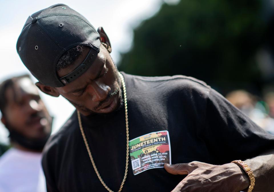 A man wearing a Juneteenth sticker during a demonstration calling for the removal of District Attorney Jackie Lacey in Los Angeles on Wednesday. (Photo: VALERIE MACON via Getty Images)