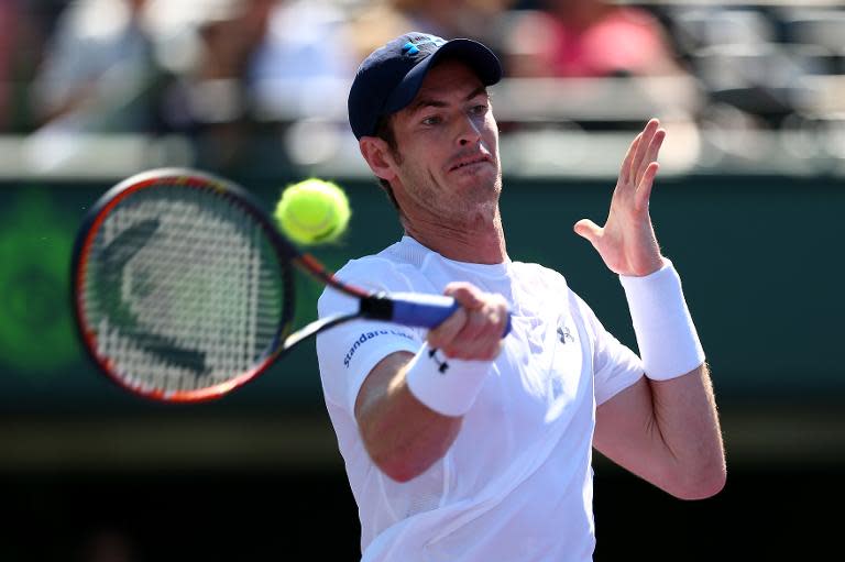 Andy Murray of Great Britain plays a forehand against Kevin Anderson of South Africa in their fourth round match during the Miami Open on March 31, 2015 in Key Biscayne, Florida