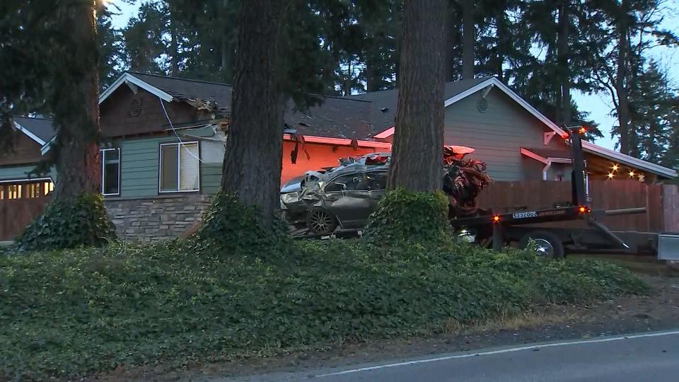 A woman was killed and her passenger has serious injuries after their car slammed into a house near Spanaway on May 4, 2023.