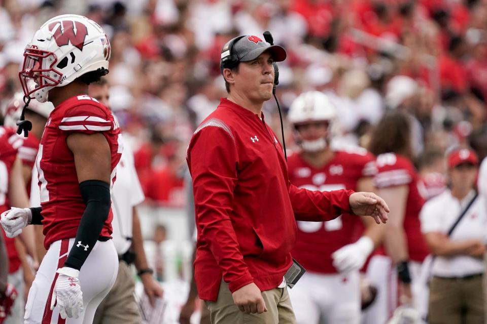 Wisconsin defensive coordinator Jim Leonhard watches during the first half of his team's game against Penn State in Madison, Wis., Saturday, Sept. 4, 2021.