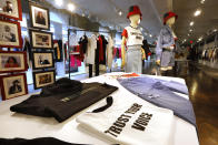 In this Feb. 20, 2020, photo, items from H&M’s new street wear collection are displayed at a store in New York. The collection was designed in collaboration with Ruth Carter, the Academy-Award winning designer behind the costumes for films such as “Black Panther” and “Malcolm X." It debuted as more companies and brands are getting into the business of Black History Month but also trying not to leave the impression that African American consumers are important just once a year. (AP Photo/Richard Drew)