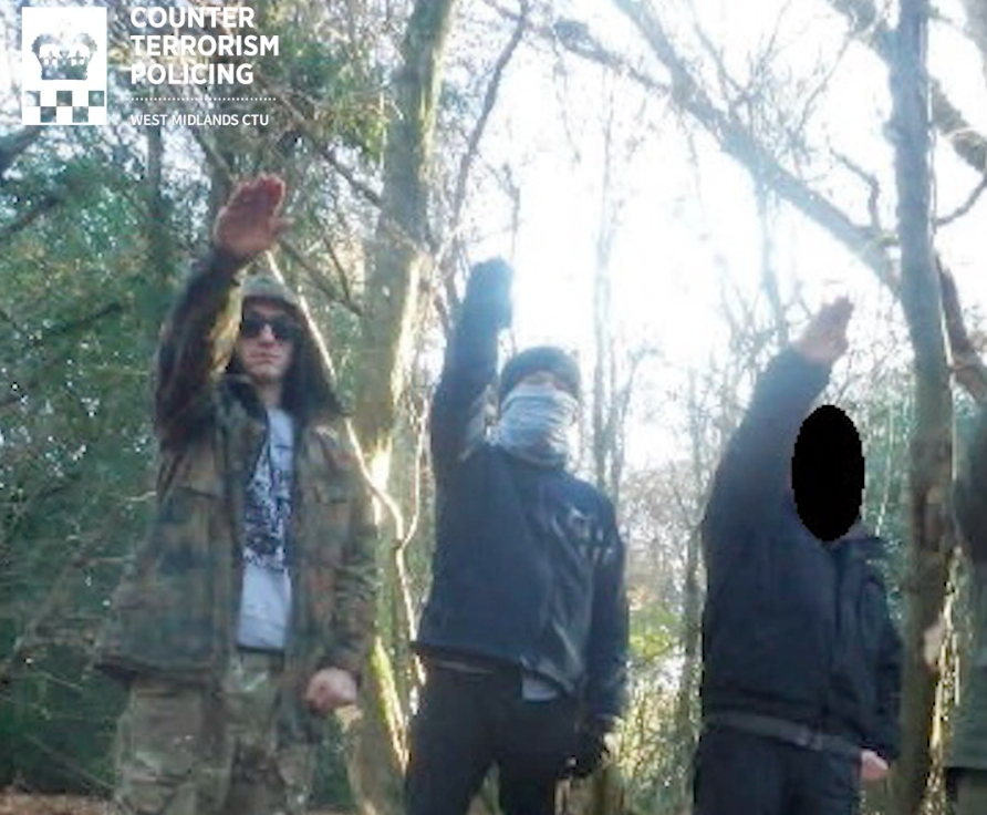 National Action members were seen performing Nazi salutes. (SWNS)