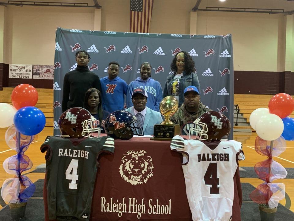 Suntarine Perkins signs with Ole Miss football at Raleigh High School Wednesday, Dec. 21, 2022. Perkins is the No. 1 recruit in the state and the highest-ranked recruit in Lane Kiffin's 2023 recruiting class.