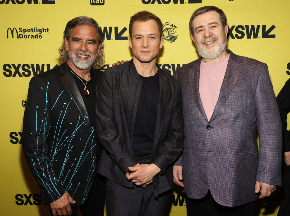 AUSTIN, TEXAS - MARCH 15: Henk Rogers, Taron Egerton, Alexey Pajitnov attend the 