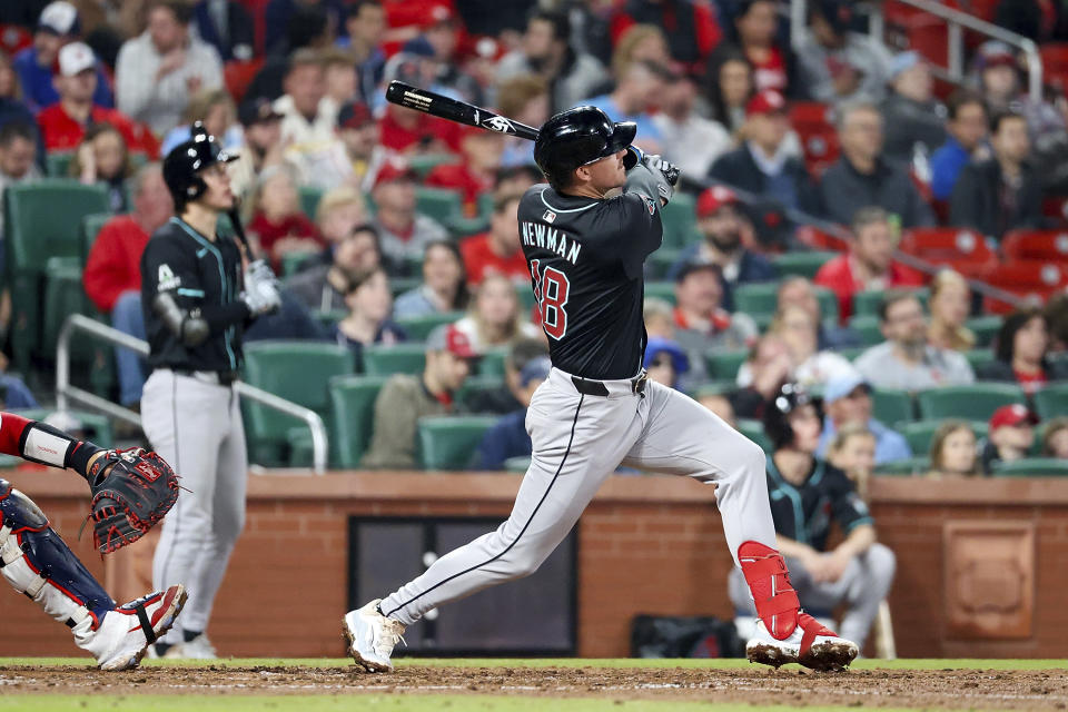 Arizona Diamondbacks' Kevin Newman watches his two-run home run against the St. Louis Cardinals during the fifth inning of a baseball game Tuesday, April 23, 2024, in St. Louis. (AP Photo/Scott Kane)