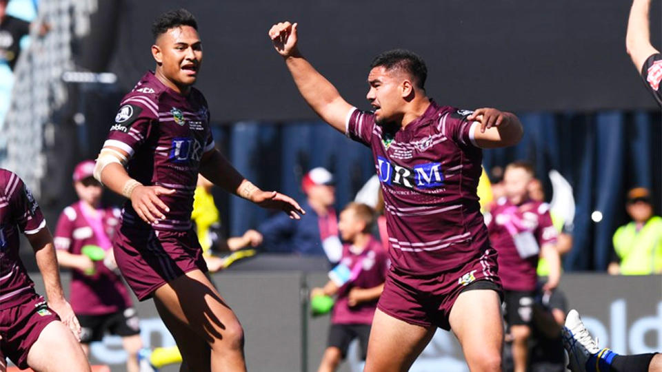 Titmuss is seen here celebrating his winning try for Manly in the 2017 NYC grand final.