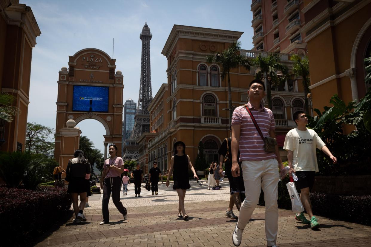 Visitors at The Plaza Macao, operated by Sands China Ltd., a unit of Las Vegas Sands Corp., on the Cotai Strip during Golden Week in Macau, China, on Sunday, April 30, 2023. 