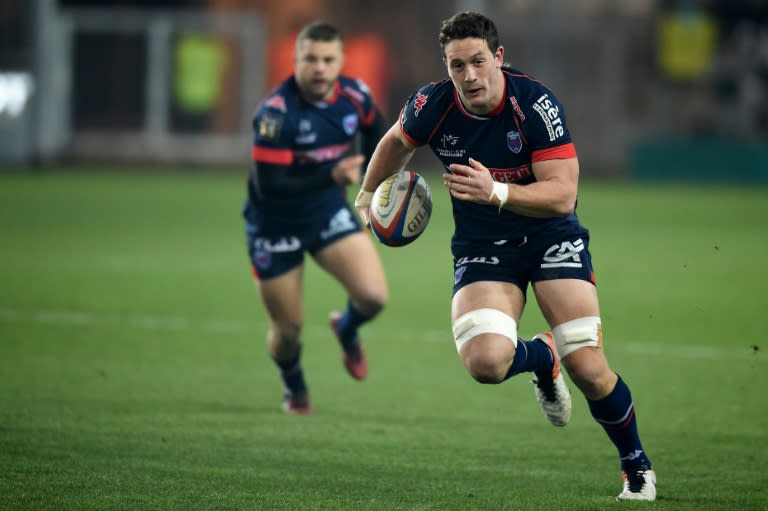 Grenoble's Rory Grice -- seen here running with the ball during a 2016 French league match against Montpellier -- has been been charged with gang rape