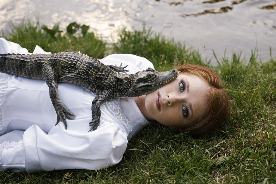 Anastasiya with a crocodile