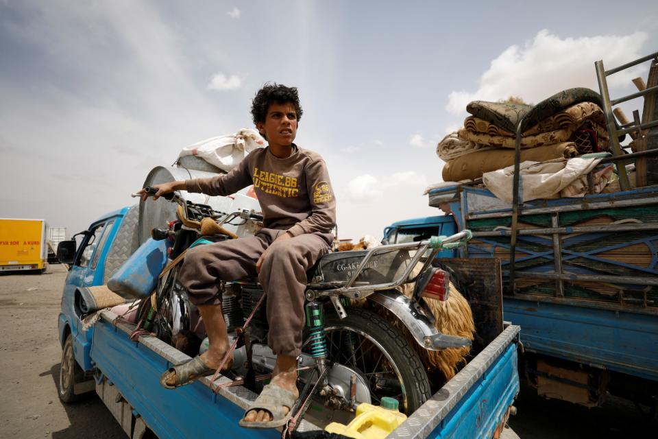 An internally displaced Syrian boy who fled Raqqa city
