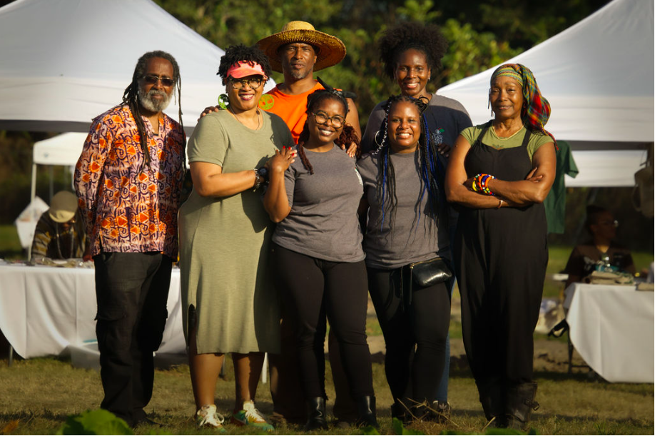 Kwasi Densu ( left rear)and Jennifer Taylor ( front, far right), pictured with National Black Food and Justice Alliance members and others at the FAMUly Roots: Food and Farm Festival in early November.