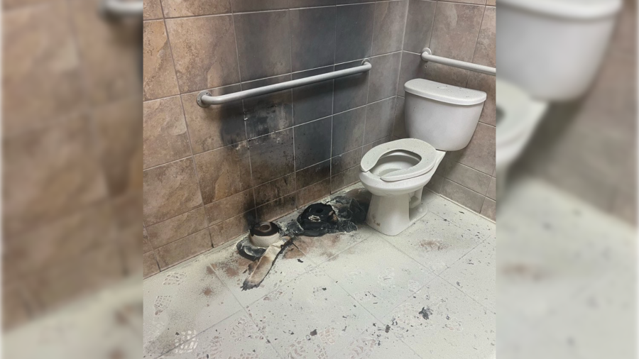 Image of a 10 Fitness bathroom with fire damage