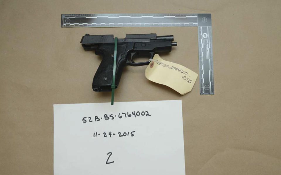 FILE - This evidence photo from the criminal complaint of the U.S. District Court for Massachusetts v. Ashley Bigsbee for illegal possession of a stolen firearm on Nov. 15, 2015, in Suffolk, Mass., shows one of ten M11 semiautomatic handguns that former Army Reserve member James Morales stole from the Lincoln Stoddard Army Reserve Center in Worcester, Mass. Overall, AP has found that at least 2,000 firearms from the Army, Marines, Navy or Air Force were lost or stolen during the 2010s. (U.S. District Court for Massachusetts via AP)