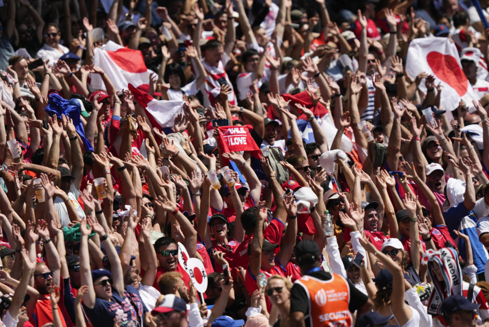 Fans react during the Rugby World Cup Pool D match between Japan and Chile at Stadium de Toulouse, Toulouse, France, Sunday, Sept. 10, 2023. (AP Photo/Lewis Joly)