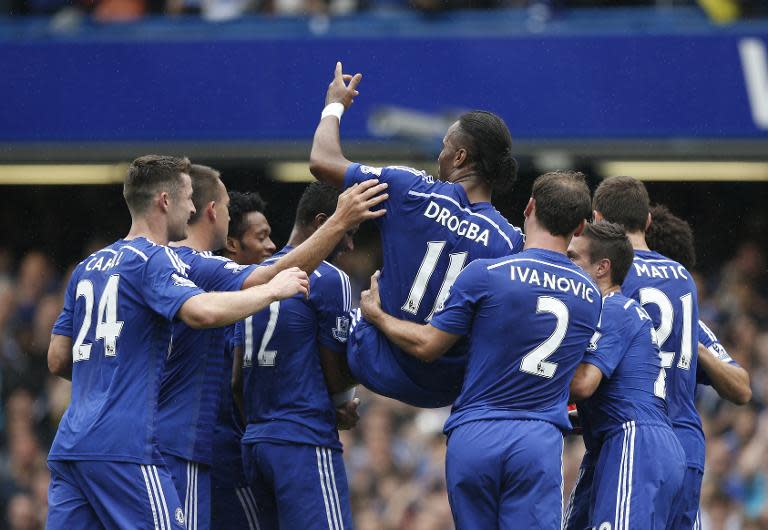 Chelsea's Didier Drogba (C) is carried off the pitch by teammates after being substituted during their English Premier League match against Sunderland, at Stamford Bridge in London, on May 24, 2015