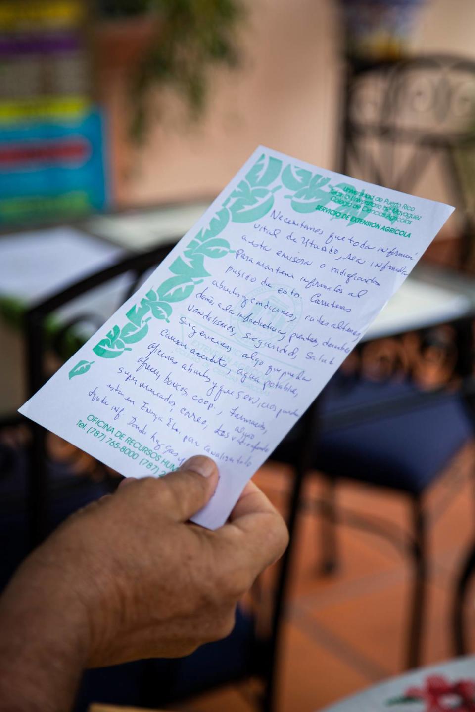 Pedro Labayen, founder of the Radio Amateur Association of Utuado, holds one of the messages he wrote and transmitted through a local radio station during Hurricane Maria.