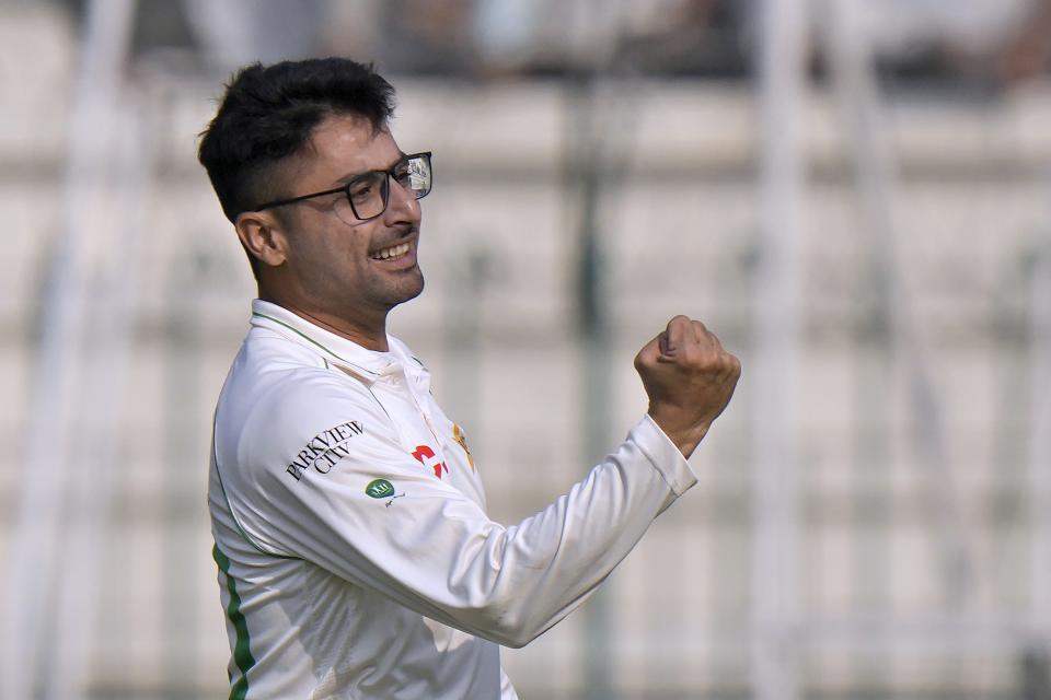 Pakistan's Abrar Ahmed celebrates after taking wicket of England's Ben Stokes during the first day of the second test cricket match between Pakistan and England, in Multan, Pakistan, Friday, Dec. 9, 2022. (AP Photo/Anjum Naveed)