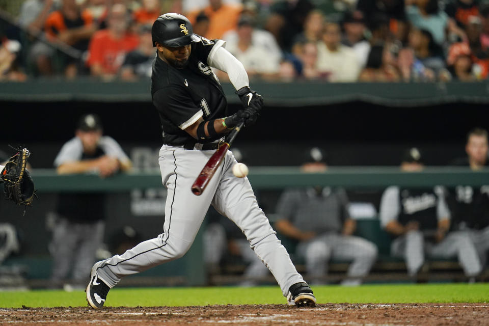 Chicago White Sox's Elvis Andrus singles against the Baltimore Orioles during the seventh inning of a baseball game, Thursday, Aug. 25, 2022, in Baltimore. (AP Photo/Julio Cortez)