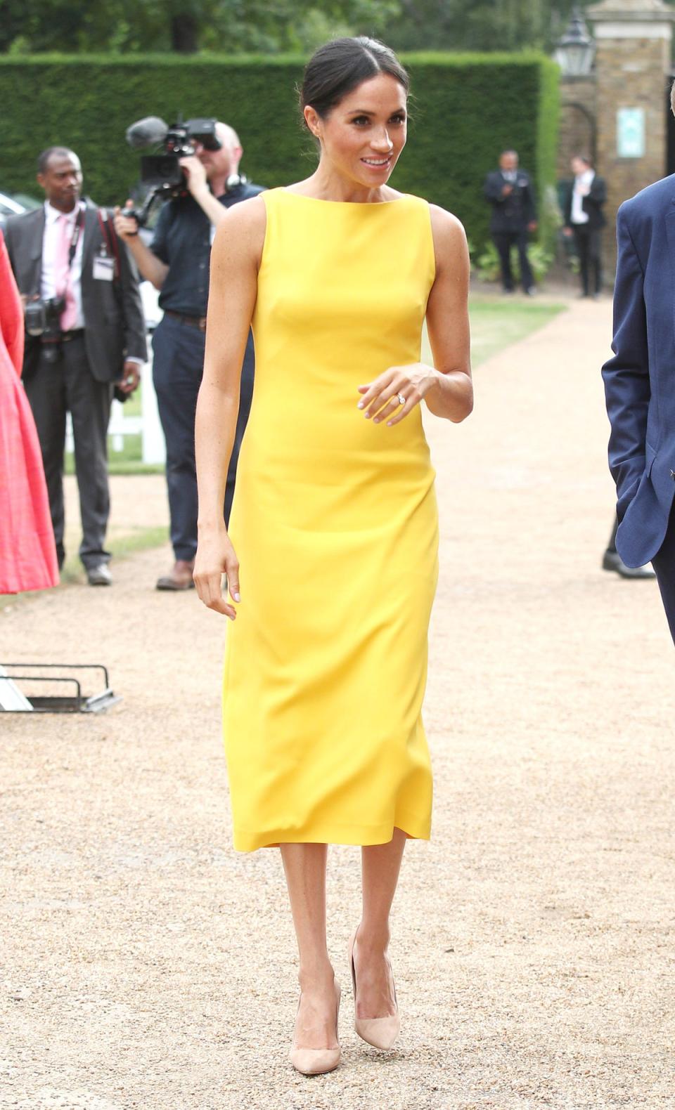 Meghan chose a vibrant yellow outfit. (Getty Images)