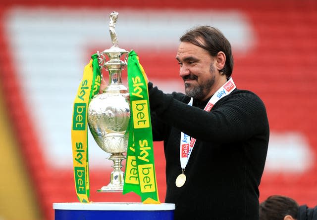 Norwich head coach Daniel Farke with the Sky Bet Championship trophy