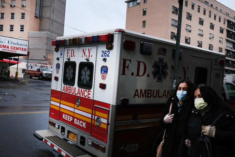 NEW YORK, NEW YORK - APRIL 03: People walk through a neighborhood in the Queens borough, which has one of the highest infection rates of coronavirus in the nation, on April 03, 2020 in New York City. Hospitals in New York City, the nation's current epicenter of the COVID-19 outbreak, are facing shortages of beds, ventilators and protective equipment for medical staff. Currently, over 100, 000 New Yorkers have tested positive for COVID-19. (Photo by Spencer Platt/Getty Images)