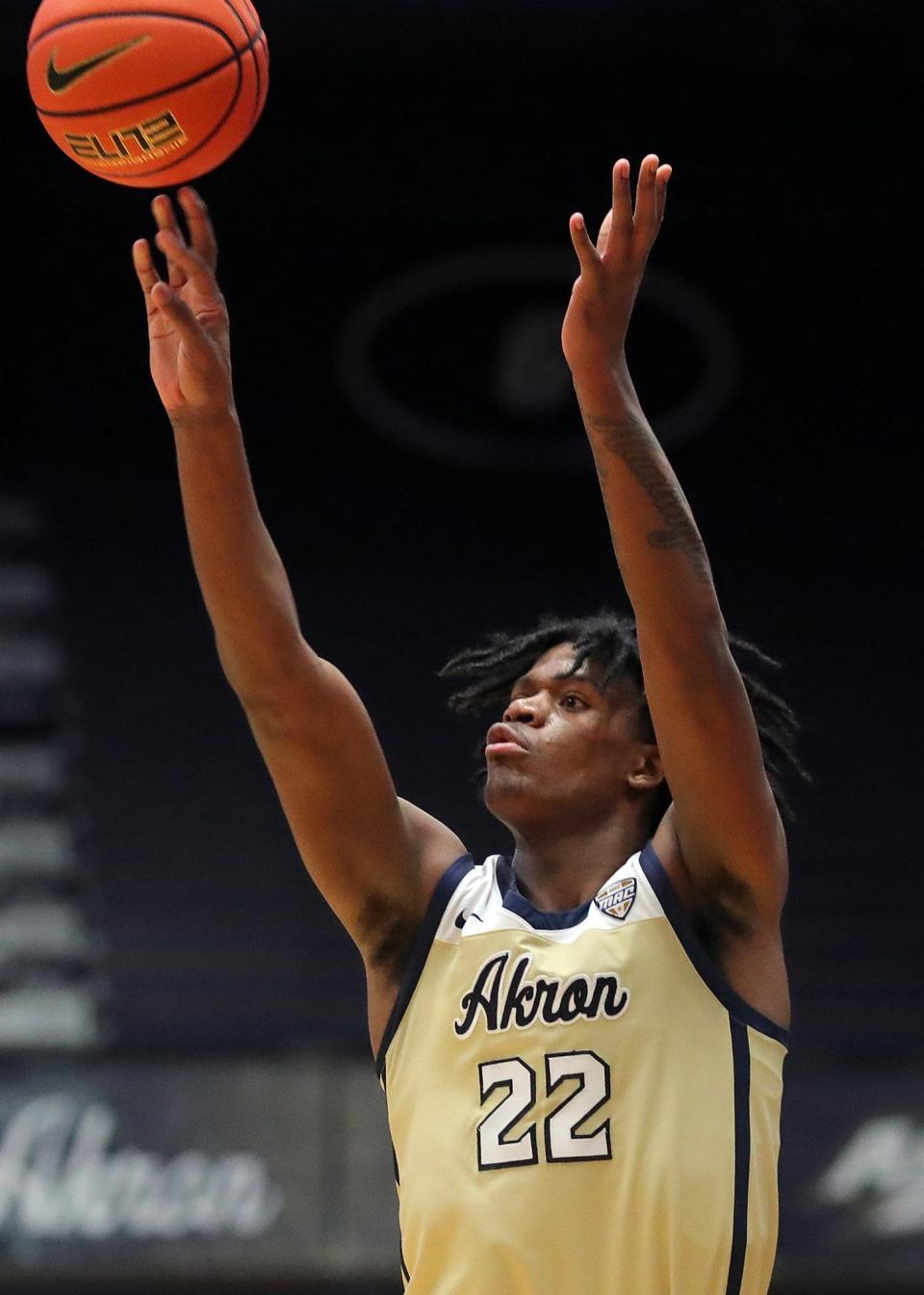 Akron Zips forward Mikal Dawson (22) makes a three during the first half of an NCAA basketball game against the Western Michigan Broncos, Tuesday, Jan. 18, 2022, in Akron, Ohio. [Jeff Lange/Beacon Journal]