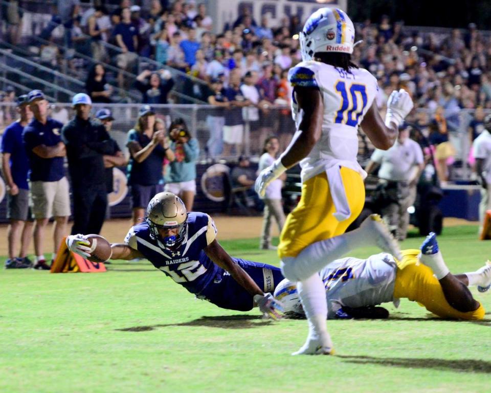 Central Catholic running back Joey Alcutt dives for the end zone in an attempt to score during a game between Central Catholic and Serra at Central Catholic High School in Modesto, California, on September 8, 2023.