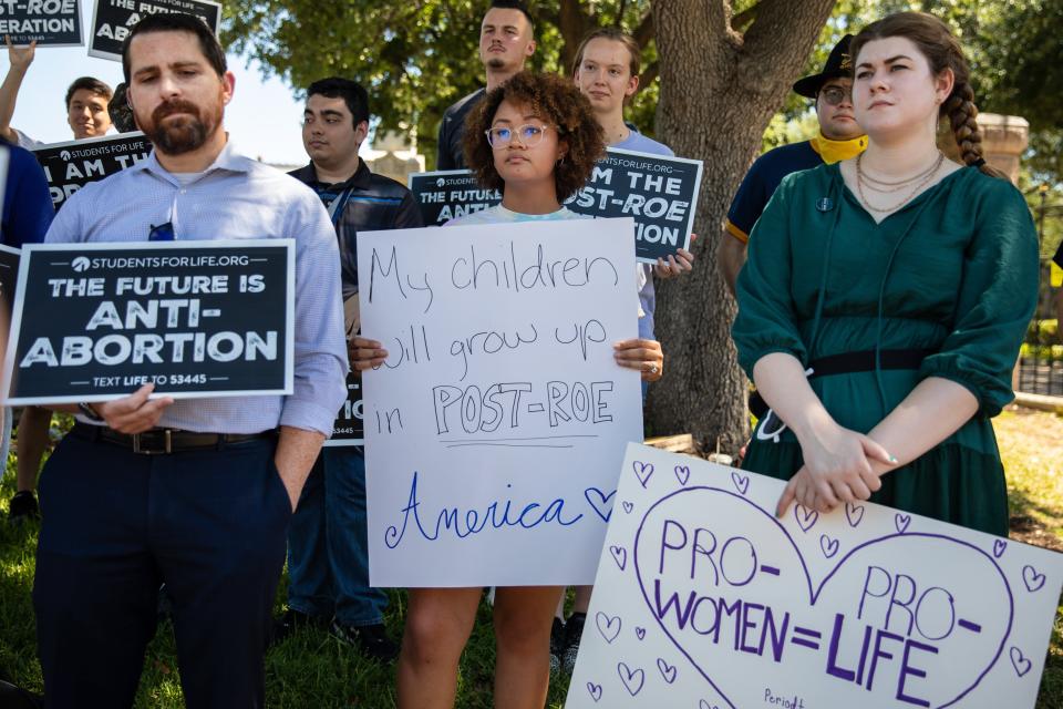 Anti-abortion demonstrators outside of the Texas Capitol the day after Roe v. Wade was overturned, in Austin, on June 25, 2022. Around the country, a patchwork of laws took hold amid protest and celebration. (Montinique Monroe/The New York Times)