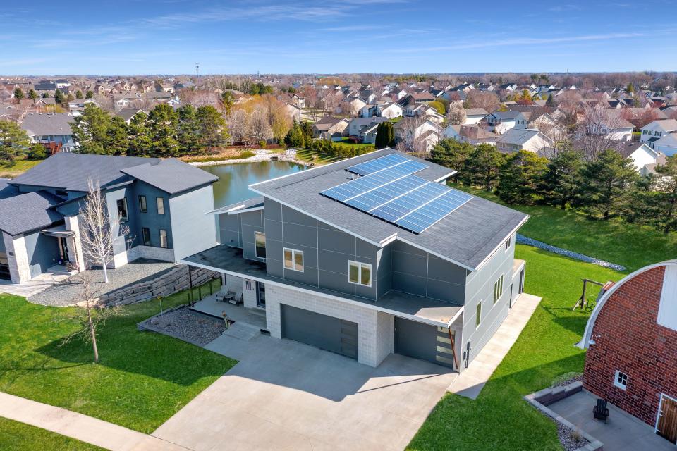 This 4,399-square-foot, 6-bedroom home in Waukee is on the market for $1.32 million. It comes with a fully stocked pond in the back yard.