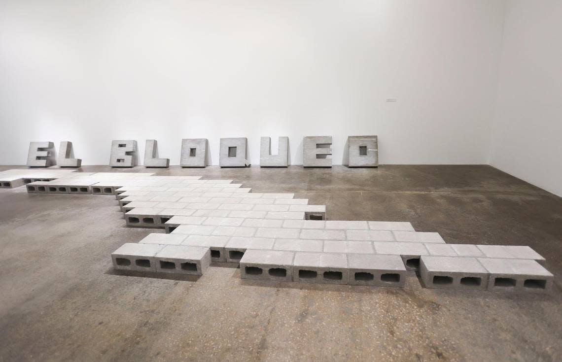 ‘El Bloqueo’ by Antonio Eligio Fernández, who goes by Tonel, is displayed for the Espacio 23 Cuban art show called “You Know Who You Are” on Tuesday, Nov. 1, 2022, in Miami. A version of the piece is also at a museum in Havana. One of the curators noted that the artists have to navigate censorship so many works can have different meanings.