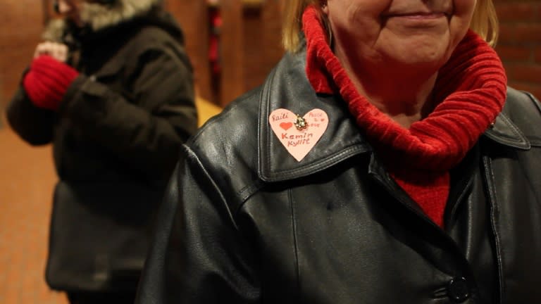 A member of the group ‘Sisters of Kyllikki’ prepares to walk through the town of Kemi hugging passers-by and handing out cards carrying positive messages