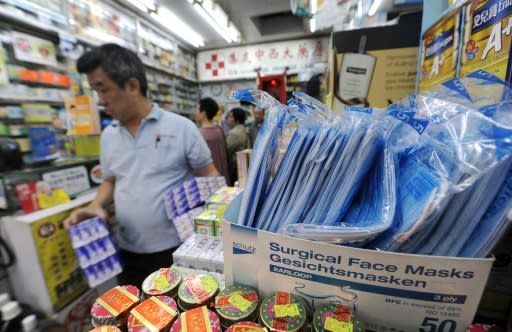 Surgical face masks are ubiquitous in Hong Kong, not just in the winter flu season