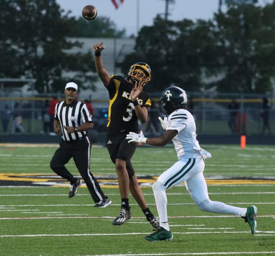 Detroit King quarterback Nathan Edwards passes against Cass Tech during first-half action at Martin Luther King Jr. High School in Detroit on Friday, Sept. 15, 2023.