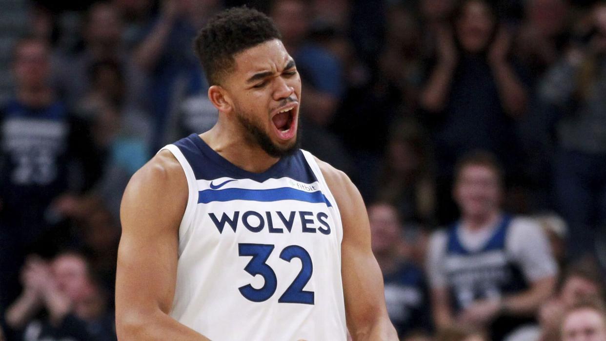 Mandatory Credit: Photo by Andy Clayton-King/AP/REX/Shutterstock (9314453i)Minnesota Timberwolves forward Karl-Anthony Towns celebrates a basket against the Oklahoma City Thunder during the fourth quarter of an NBA basketball game, in Minneapolis.