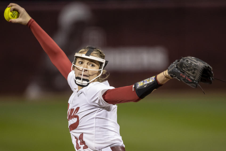 FILE - Alabama pitcher Montana Fouts pitches against Georgia Southern on Feb. 10, 2023, during an NCAA college softball game in Tuscaloosa, Ala. Alabama features veteran pitcher Fouts and outfielder Faith Hensley. (AP Photo/Vasha Hunt, File)