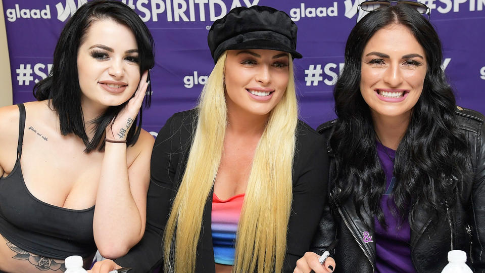 Paige, Mandy Rose and Sonya DeVille, pictured here at New York Comic Con in 2018.
