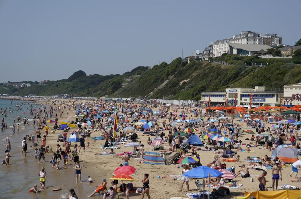 Sunbathers in Bournemouth on Friday (PA Wire)