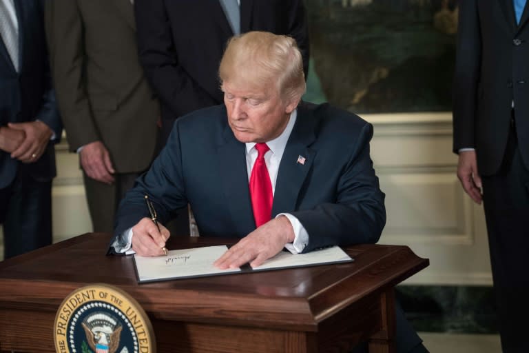 In signing a memorandum launching a trade investigation targeting China, US President Donald Trump said Washington would no longer 'turn a blind eye' to unfair practices