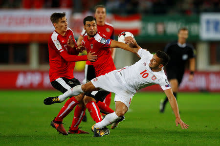 Soccer Football - 2018 World Cup Qualifications - Europe - Austria vs Serbia - Ernst Happel Stadion, Vienna, Austria - October 6, 2017 Serbia’s Dusan Tadic in action with Austria’s Maximilian Wober and Aleksandar Dragovic REUTERS/Leonhard Foeger