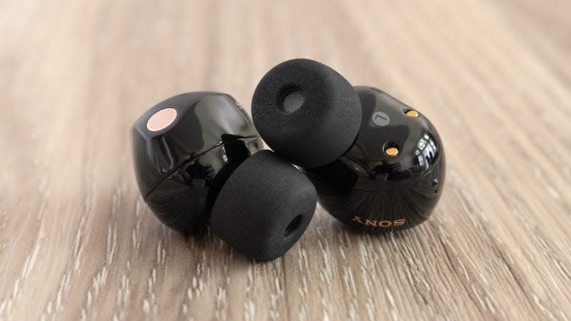 Sony still includes memory foam eartips with its new WF-1000XM5 wireless earbuds, but now include four different size options instead of three. - Photo: Andrew Liszewski | Gizmodo