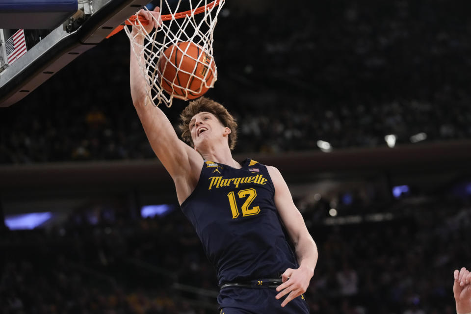 Marquette forward Ben Gold dunks during the second half of an NCAA college basketball game against UConn in the championship of the Big East Conference tournament, Saturday, March 16, 2024, in New York. UConn won 73-57. (AP Photo/Mary Altaffer)