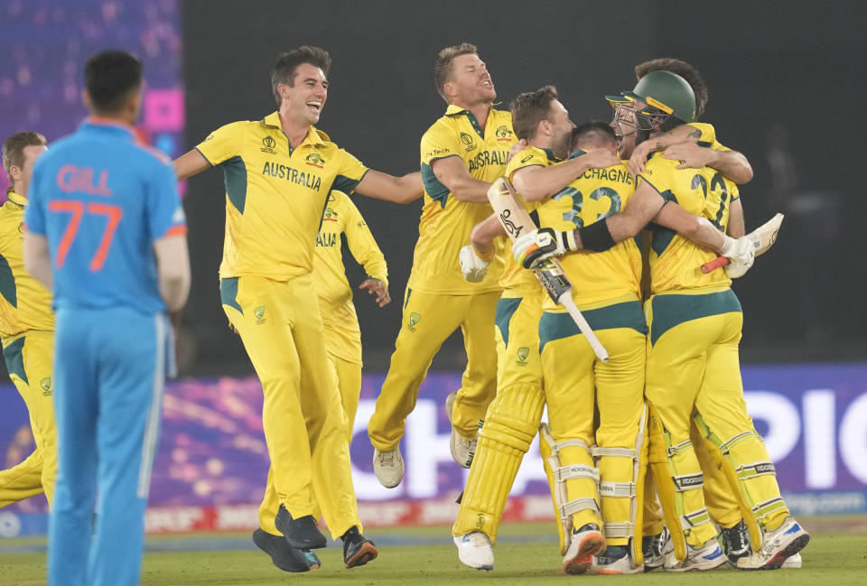 Australia's players celebrate after Australia won the ICC Men's Cricket World Cup final match against India in Ahmedabad, India, Sunday, Nov. 19, 2023. (AP Photo/Rafiq Maqbool)